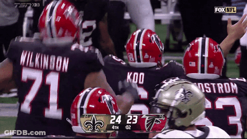 Football Players In Front Of Scoreboard 16-13 Final GIF