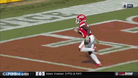 Football Players In Front Of Touchdown Sign GIF