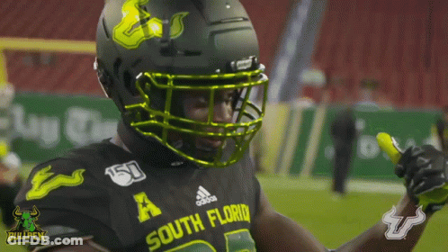 Football Players In Green Uniforms Bullpen GIF