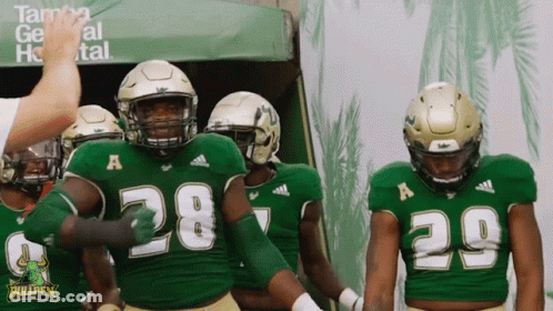 Football Players In Green Uniforms Number 28 GIF