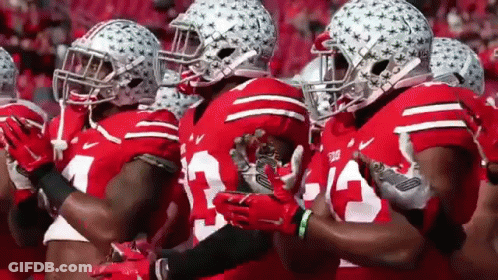 Football Players In Red And White Uniforms GIF
