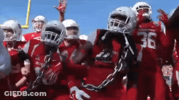 Football Players In Red Uniforms Number 36 GIF