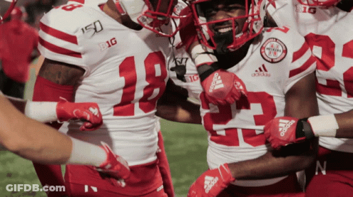 Football Players In Red White Uniforms With Adidas Gloves GIF