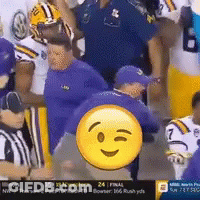 Football Players In Stadium With Smiley Face GIF