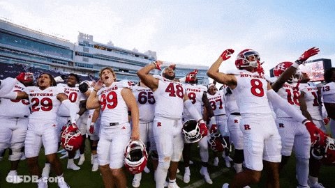 Football Players In White Uniforms With Letter R GIF