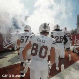 Football Players Including Kolka Number 80 GIF