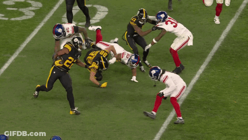Football Players Including Number 33 GIF