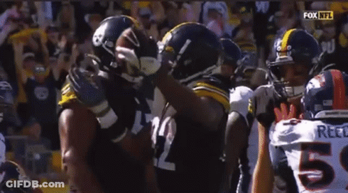 Football Players Including Number 65 And Reed GIF