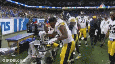 Football Players Including Number 65 And Reed GIF