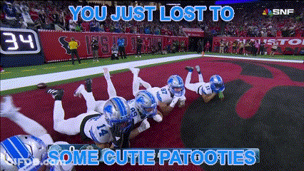 Football Players Laying On Ground Saying You Just Lost To Some Cutie Patooties GIF