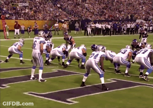 Football Players Lined Up With Letter T GIF
