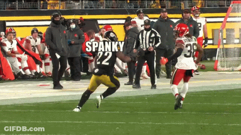 Football Players Miller 40 And Settle Jr 99 On Field GIF