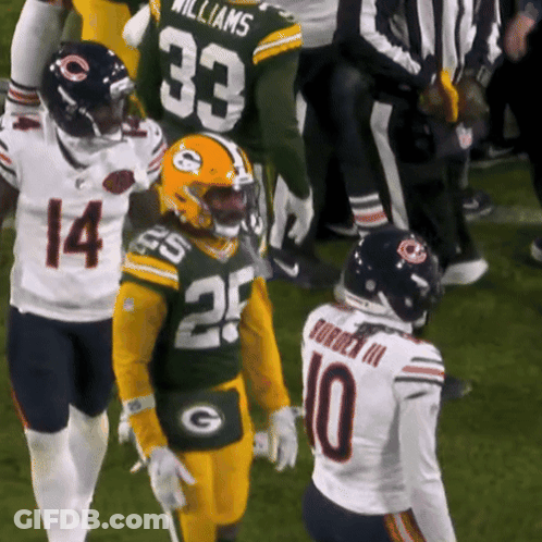 Football Players Number 10 And 33 Talking GIF