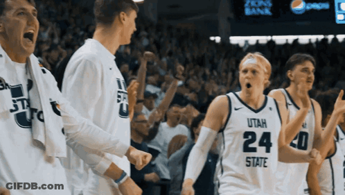Football Players Number 11 Huddled Together GIF