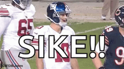 Football Players On Field One Wearing Helmet GIF