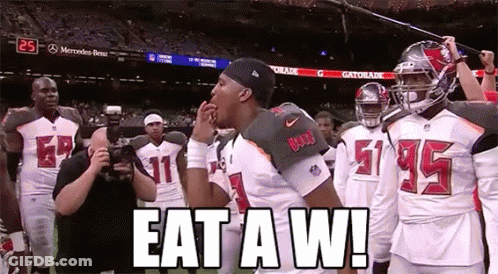 Football Players On Field Saying Eat A W GIF