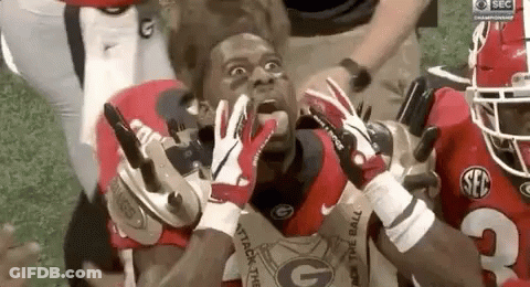Football Players On Field With Jersey Number 10 GIF