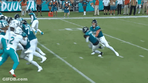 Football Players On Field With Number 135 GIF