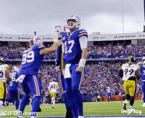 Football Players On Field With Number 17 GIF