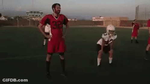 Football Players On Field With Number 29 Jersey GIF