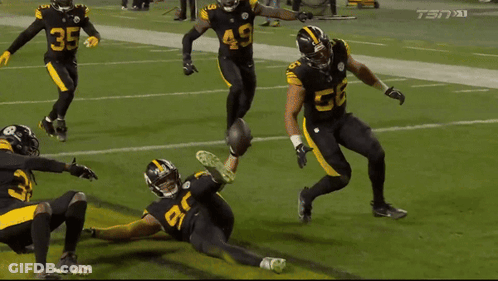 Football Players On Field With Number 35 GIF