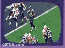 Football Players On Field With Number 64 GIF