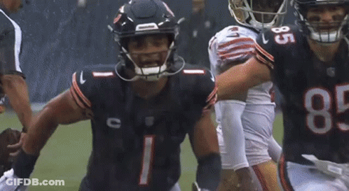 Football Players On Field With Number 8 Jersey GIF