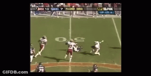 Football Players On Field With Referee And NFL Scoreboard GIF