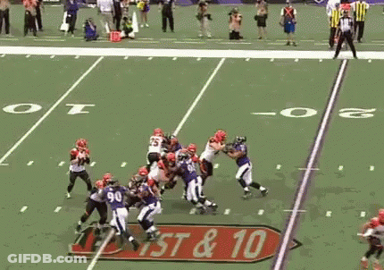 Football Players On Field With West & 10 Sign GIF