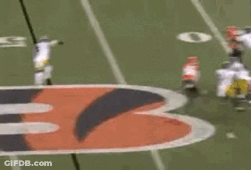 Football Players Playing Game With Crowd Watching GIF