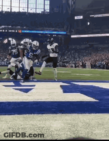 Football Players Playing On Field GIF