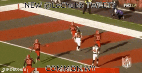Football Players Playing On Field GIF