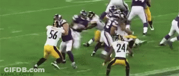 Football Players Playing On Field Number 63 GIF