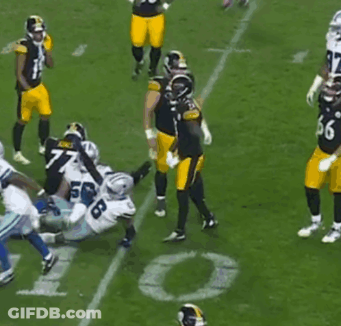 Football Players Playing On Field With Number 10 GIF