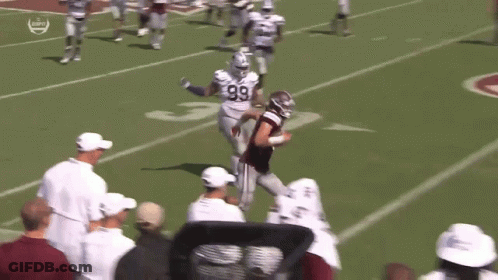 Football Players Playing On Field With Number 3 GIF