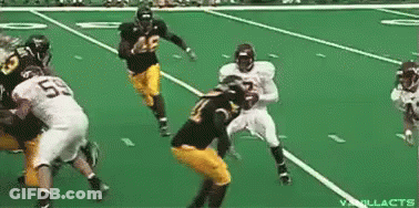Football Players Playing On Green Field GIF