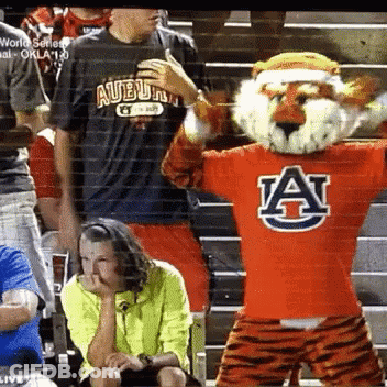 Football Players Playing With Referee GIF