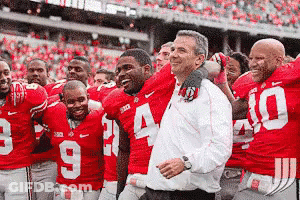 Football Players Posing With Number 10 GIF
