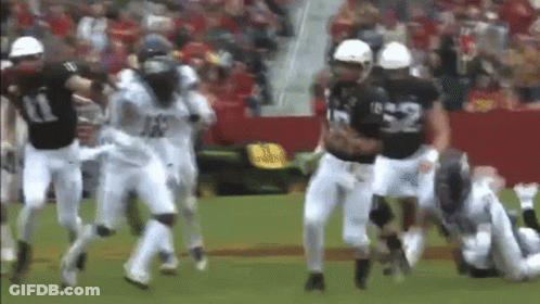 Football Players Running Number 52 Jersey GIF