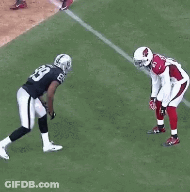 Football Players Running On Field GIF