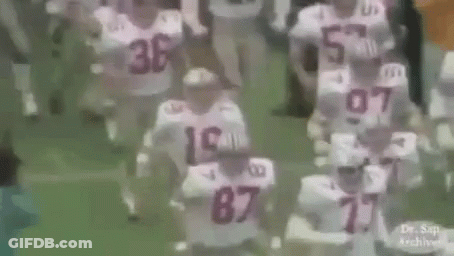 Football Players Running On Field GIF