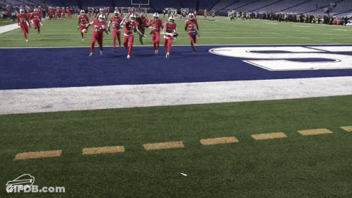 Football Players Running With Buffalo Logo GIF