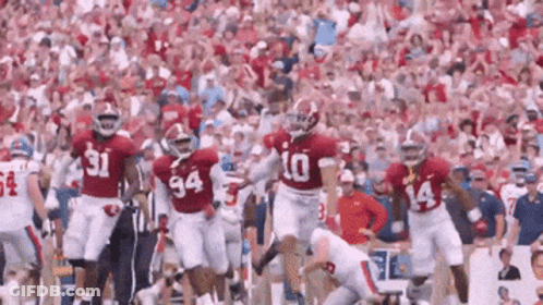 Football Players Running With Number 10 Jersey GIF