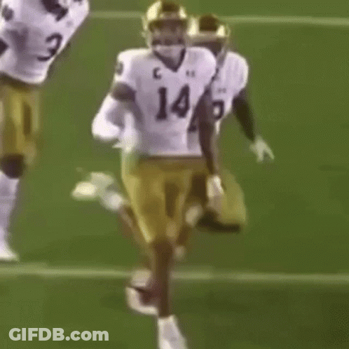 Football Players Running With Number 1429 Jersey GIF