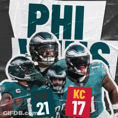 Football Players Standing By KC 17 Sign GIF