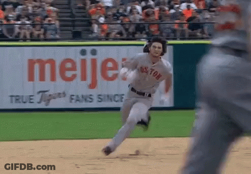 Football Players Standing On Field GIF