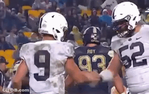 Football Players Standing Together GIF