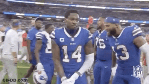 Football Players Walking On Field GIF