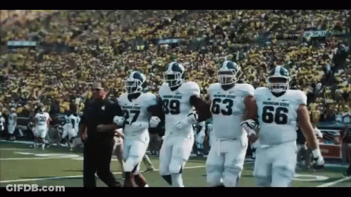Football Players Walking With Number 69 Jersey GIF