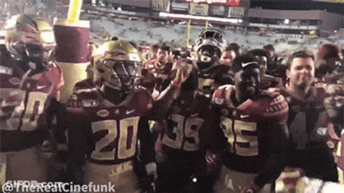 Football Players Wearing Jerseys With Numbers 20 And 35 GIF